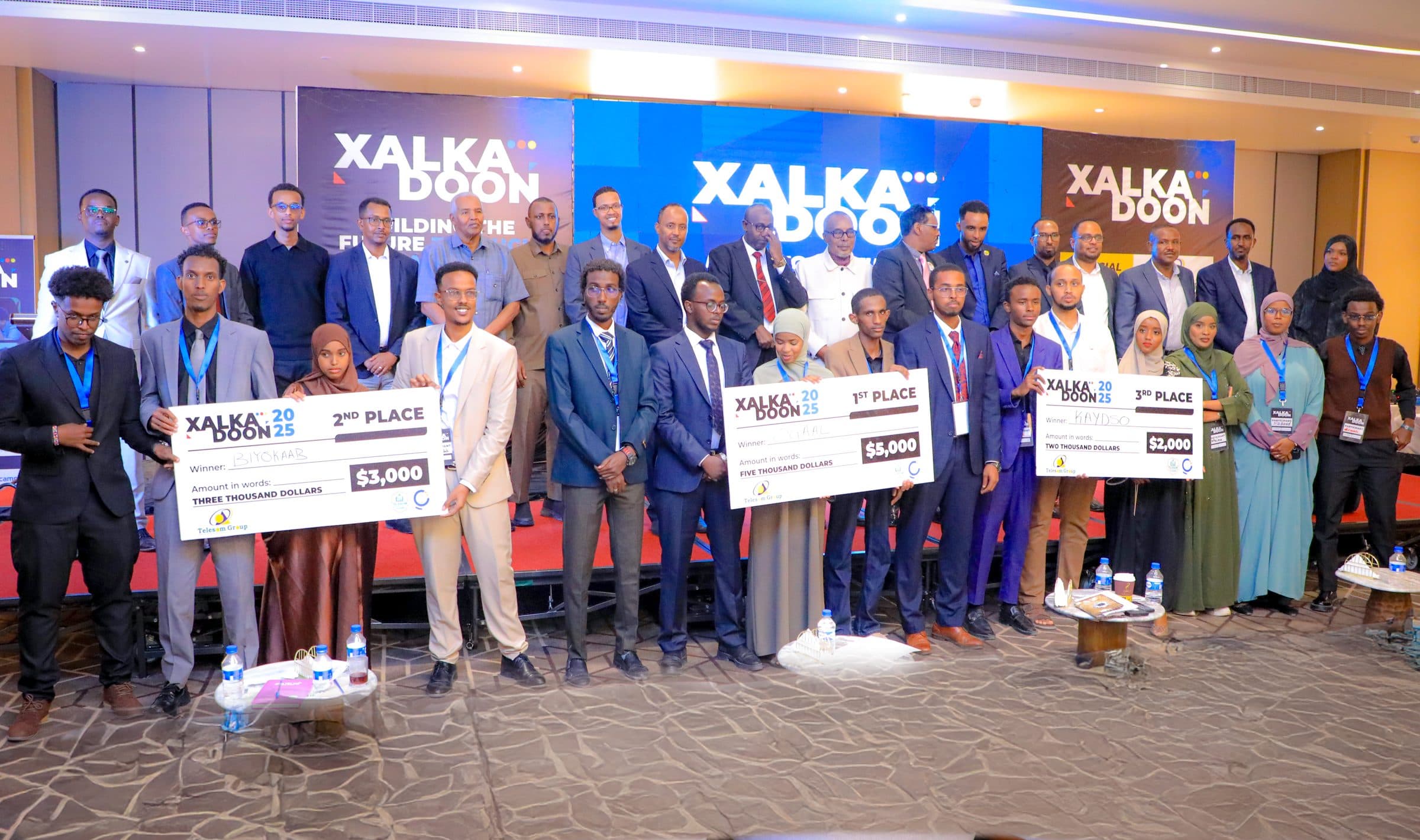 Xalkadoon 2025 winners and organisers on stage