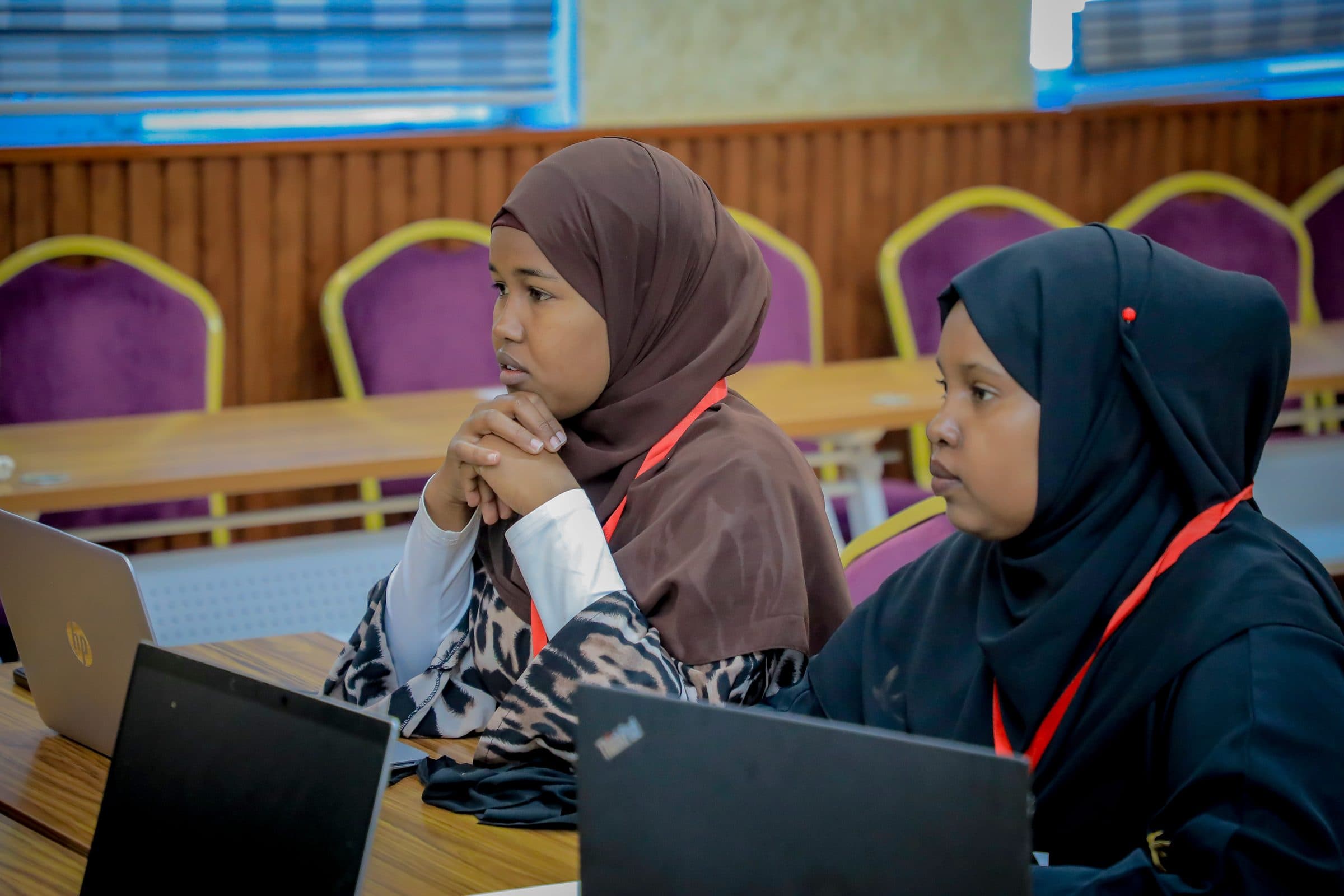 A team working at their laptops during a build session